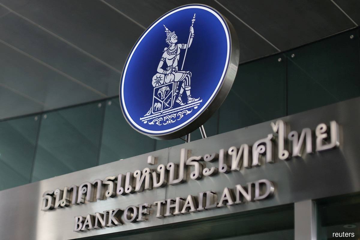 Thai central bank raises key interest rate, trims growth outlook